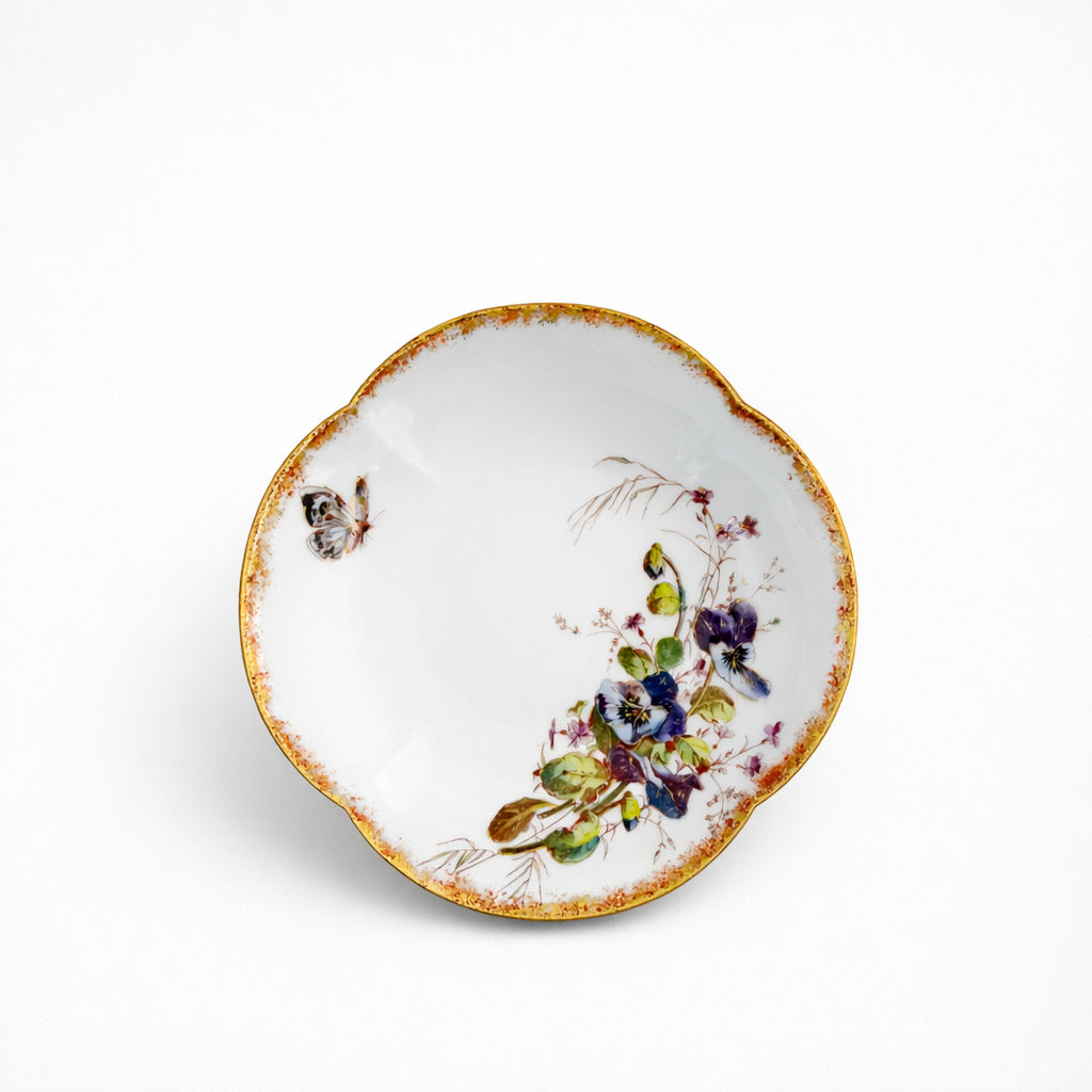 compotier en porcelaine Limoges William Guerin & Cie à décor de fleurs polychromes et papillon liseré doré