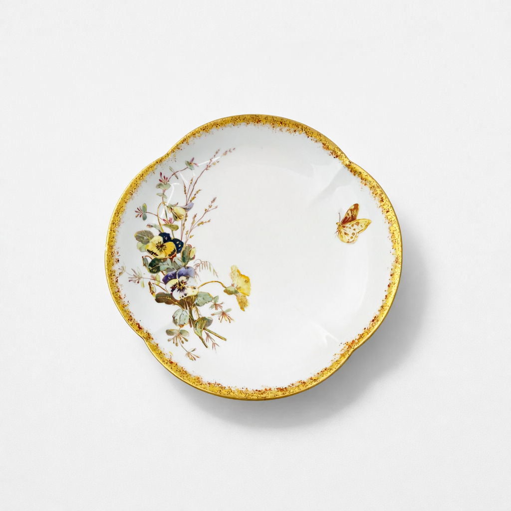 compotier en porcelaine Limoges William Guerin & Cie à décor de fleurs polychromes et papillon liseré doré