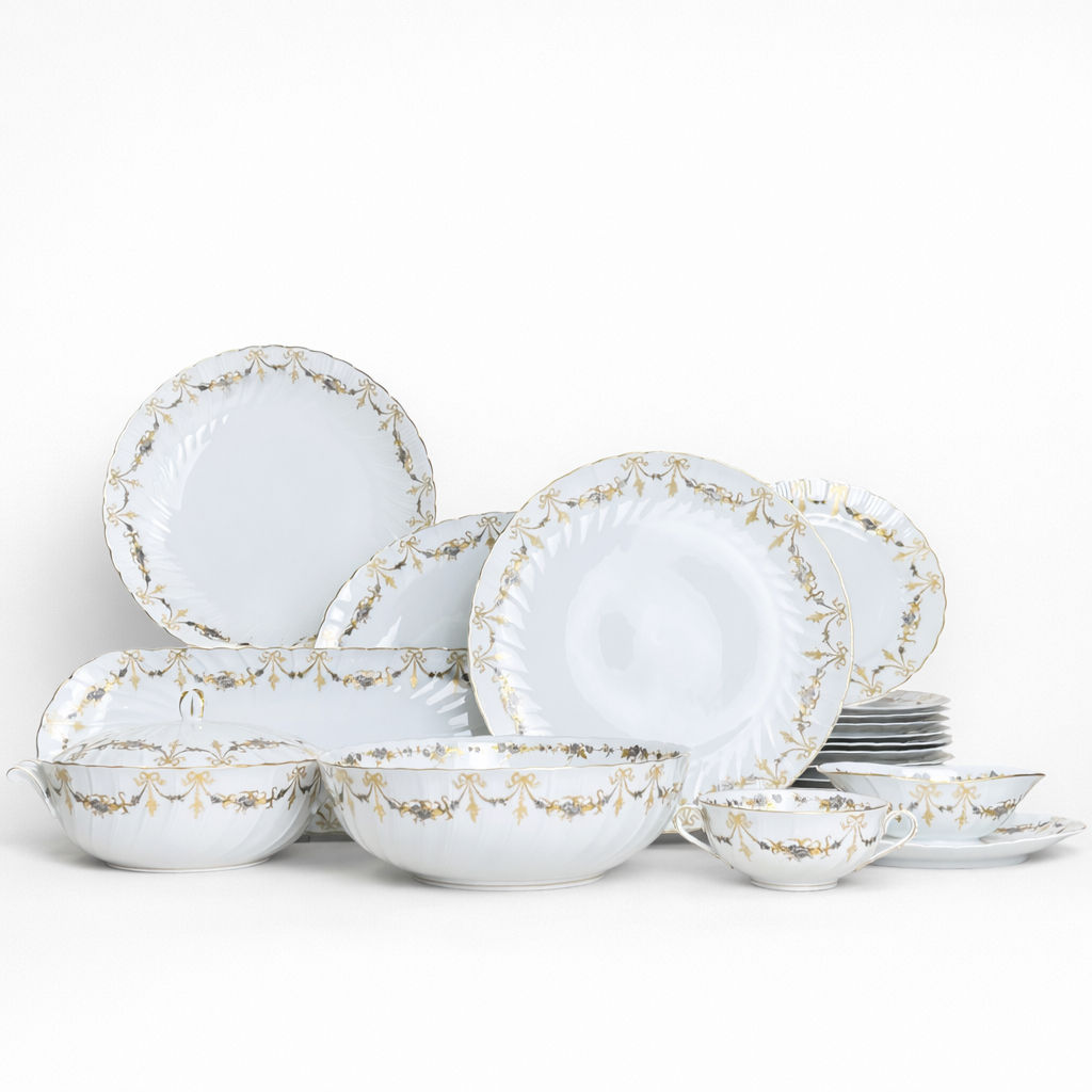 saladier en porcelaine Bernardaud modèle Marie-Thérèse fond blanc décor doré et argenté noeuds et guirlandes H 8,5 x D 26 cm